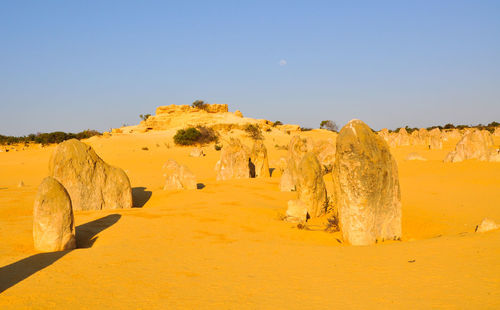 Scenic view of rock formation against clear sky