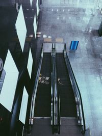 High angle view of arrow sign on road in city