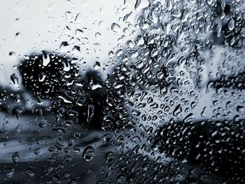 Close-up of water drops on glass