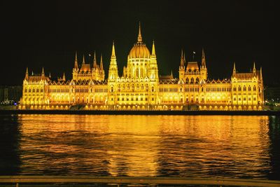 Illuminated city lit up at night