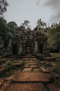 Old ruins of building against sky