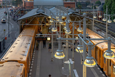 High angle view of illuminated railroad station in city