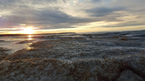 Scenic view of sea at sunset