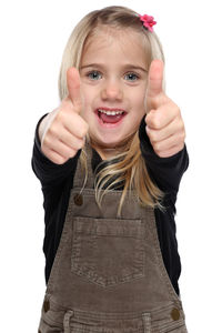 Portrait of a smiling girl over white background