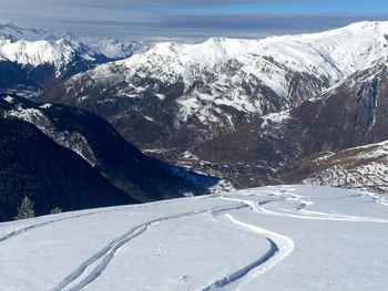 Scenic view of snow covered mountains