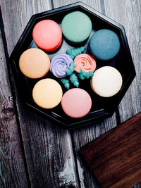 High angle view of multi colored candies on table