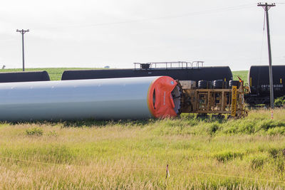 Train on field against sky