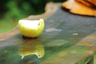 Close-up of yellow fruit on table