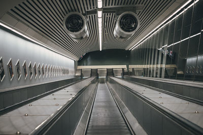 Interior of illuminated subway station
