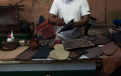 Man preparing food on table