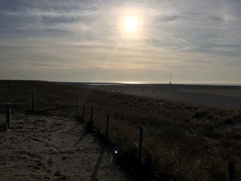 Scenic view of beach against sky