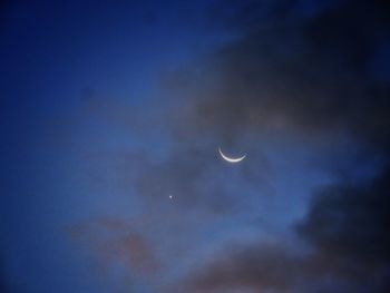 Low angle view of moon in sky