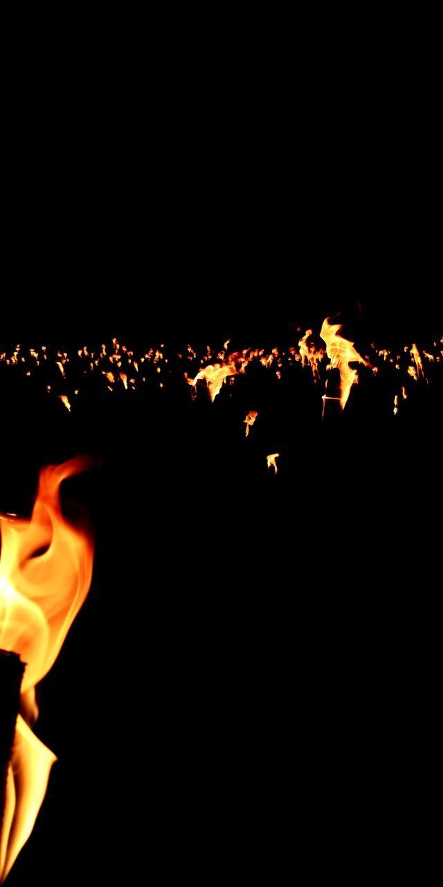 LOW ANGLE VIEW OF BONFIRE AGAINST BLACK BACKGROUND AT NIGHT