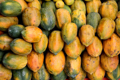 Full frame shot of papaya fruits for sale at market stall