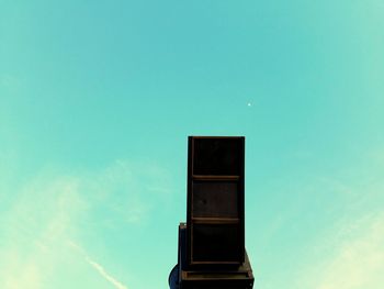 Low angle view of built structure against blue sky