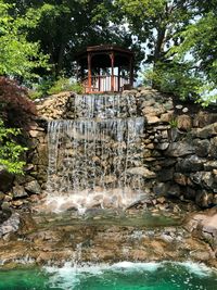 Scenic view of waterfall in forest