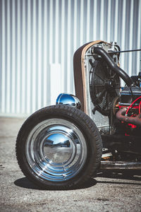 Close-up of vintage car on road