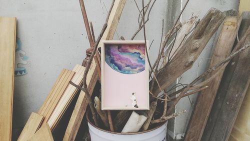 Close-up of paintbrushes on wood