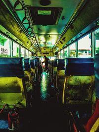 Train in illuminated underground walkway