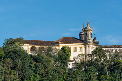 View of historical building against blue sky