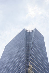 Low angle view of modern building against sky