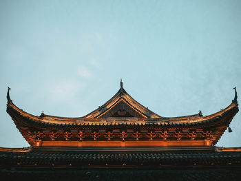 Low angle view of temple building against sky