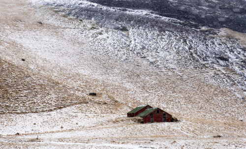 High angle view of abandoned car on beach