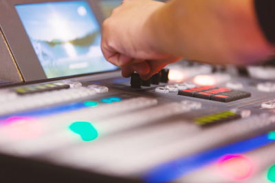 Cropped image of man using sound mixer 