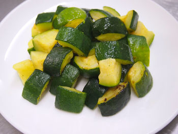 High angle view of chopped fruits in plate