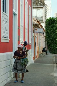 Woman standing in city