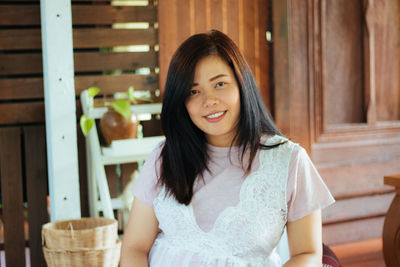 Portrait of smiling young woman