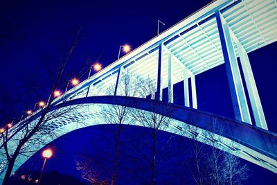Low angle view of illuminated bridge