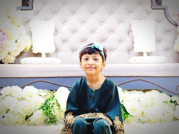 Portrait of smiling boy sitting