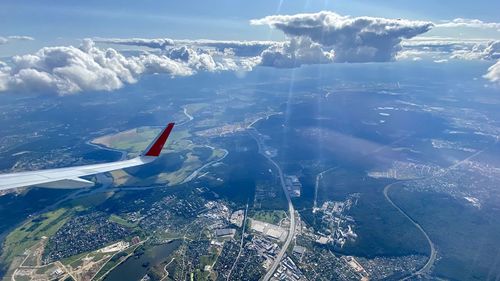 Aerial view of cityscape against sky