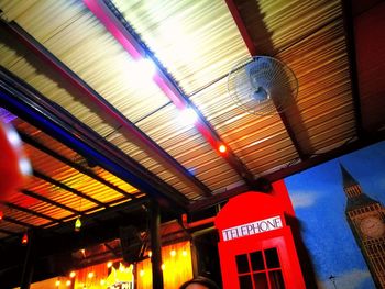 Low angle view of illuminated ceiling