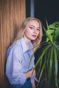 Portrait of young woman with blond hair