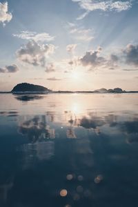 Scenic view of sea against sky at sunset