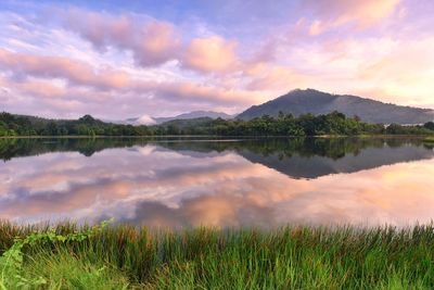 Scenic view of lake against sky during sunset