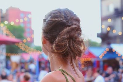 Rear view of woman at music concert