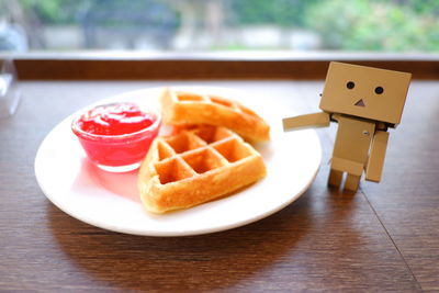 Close-up of breakfast served on table