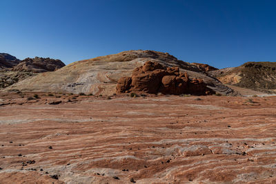 Scenic view of rocky mountains against clear sky