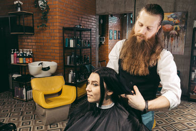 Side view of woman with dog