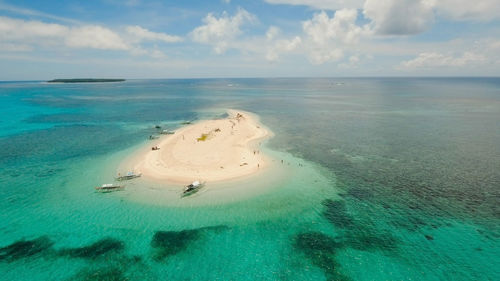 Aerial view beautiful beach on tropical island. siargao island, philippines.