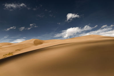 Scenic view of desert against sky