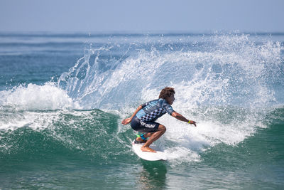 Man surfing in sea