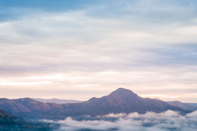 Scenic view of mountains against sky during sunset