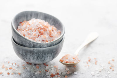 Bowl of himalayan pink salt . healthy food concept. speciality salt.