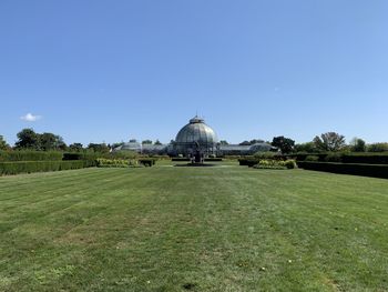 Built structure on field against clear sky