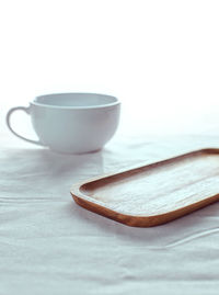 Close-up of coffee on table against white background