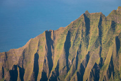 Panoramic view of rocks on beach against sky